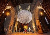 Museum of the Moon by Luke Jerram at Southwark Cathedral, London, UK.