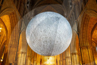 Museum of the Moon by Luke Jerram at Southwark Cathedral, London, UK.
