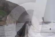 Surfers Enjoy Storm Babet in Folkestone, UK.