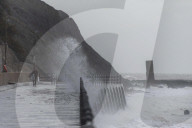Surfers Enjoy Storm Babet in Folkestone, UK.