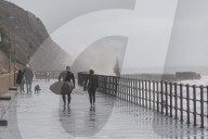 Surfers Enjoy Storm Babet in Folkestone, UK.