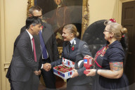 Prime Minister Rishi Sunak and his wife buy poppies