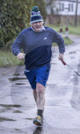 Former Prime Minister Boris Johnson jogging in Wallingford, UK.