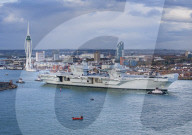 HMS Queen Elizabeth sails from Portsmouth, UK.