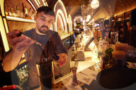 Shuffle board, axe-throwing and bingo: activity bar boom defies UK hospitality downturn