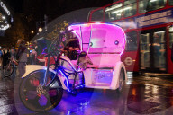 'It's like a jungle': London's pedicab cyclists welcome licences but not price controls.