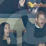 Harry and Meghan in good spirits at ice hockey game