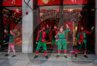 Christmas shoppers search for black friday deals, London, UK.