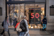 Christmas shoppers search for black friday deals, London, UK.