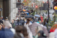 Christmas shoppers search for black friday deals, London, UK.