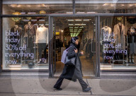 Christmas shoppers search for black friday deals, London, UK.