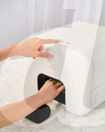 Home manicure machine uses AI and a robotic arm