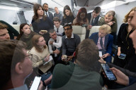 The Prime Minister Rishi Sunak talks to the media on his way to COP28