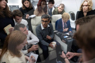 The Prime Minister Rishi Sunak talks to the media on his way to COP28
