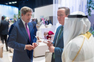 The Foreign Secretary David Cameron talks to other leaders at COP28