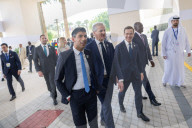 The Prime Minister Rishi Sunak talks to other world leaders at COP28