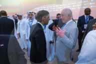 The Prime Minister Rishi Sunak talks to other world leaders at COP28