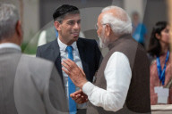 The Prime Minister Rishi Sunak talks to other world leaders at COP28