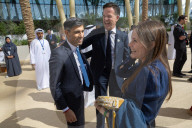 The Prime Minister Rishi Sunak talks to other world leaders at COP28