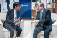 The Prime Minister Rishi Sunak talks to other world leaders at COP28