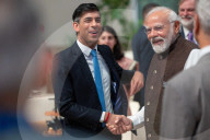 The Prime Minister Rishi Sunak talks to other world leaders at COP28