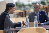 The Prime Minister Rishi Sunak talks to other world leaders at COP28