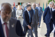 The Prime Minister Rishi Sunak talks to other world leaders at COP28