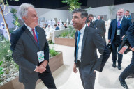 The Prime Minister Rishi Sunak talks to other world leaders at COP28