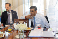 The Prime Minister Rishi Sunak talks to the media ahead of COP28