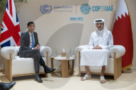 The Prime Minister Rishi Sunak talks to other world leaders at COP28