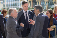 The Prime Minister Rishi Sunak talks to other world leaders at COP28