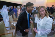 The Prime Minister Rishi Sunak talks to other world leaders at COP28
