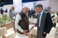 The Prime Minister Rishi Sunak talks to other world leaders at COP28