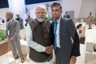 The Prime Minister Rishi Sunak talks to other world leaders at COP28