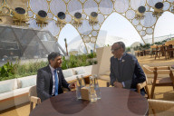 The Prime Minister Rishi Sunak talks to other world leaders at COP28
