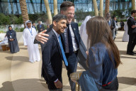 The Prime Minister Rishi Sunak talks to other world leaders at COP28