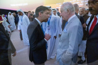 The Prime Minister Rishi Sunak talks to other world leaders at COP28
