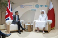 The Prime Minister Rishi Sunak talks to other world leaders at COP28