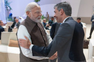 The Prime Minister Rishi Sunak talks to other world leaders at COP28
