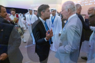 The Prime Minister Rishi Sunak talks to other world leaders at COP28