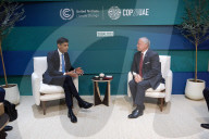 The Prime Minister Rishi Sunak talks to other world leaders at COP28
