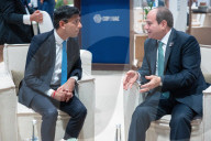 The Prime Minister Rishi Sunak talks to other world leaders at COP28