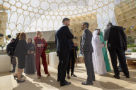 The Prime Minister Rishi Sunak talks to other world leaders at COP28
