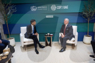 The Prime Minister Rishi Sunak talks to other world leaders at COP28