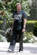 **EXCLUSIVE** Johnny Hallyday, known as the 'biggest rock-star you've never heard of,' checks out an open house in his Los Angeles neighborhood