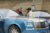Johnny Hallyday climbs into his blue Rolls Royce after dinning at SOHO in Malibu
