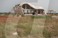 Akon City: tumbleweed rolls through site of rapper's Wakanda-inspired dream.