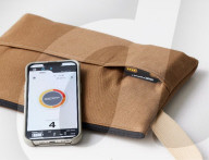 Shoulder bag heats up meals on the go or keep drinks cool