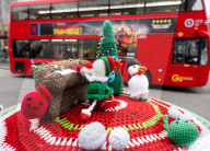 Christmas postbox topper outside Colliers Wood tube station, London, UK. 