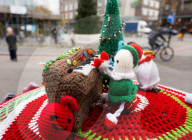 Christmas postbox topper outside Colliers Wood tube station, London, UK. 